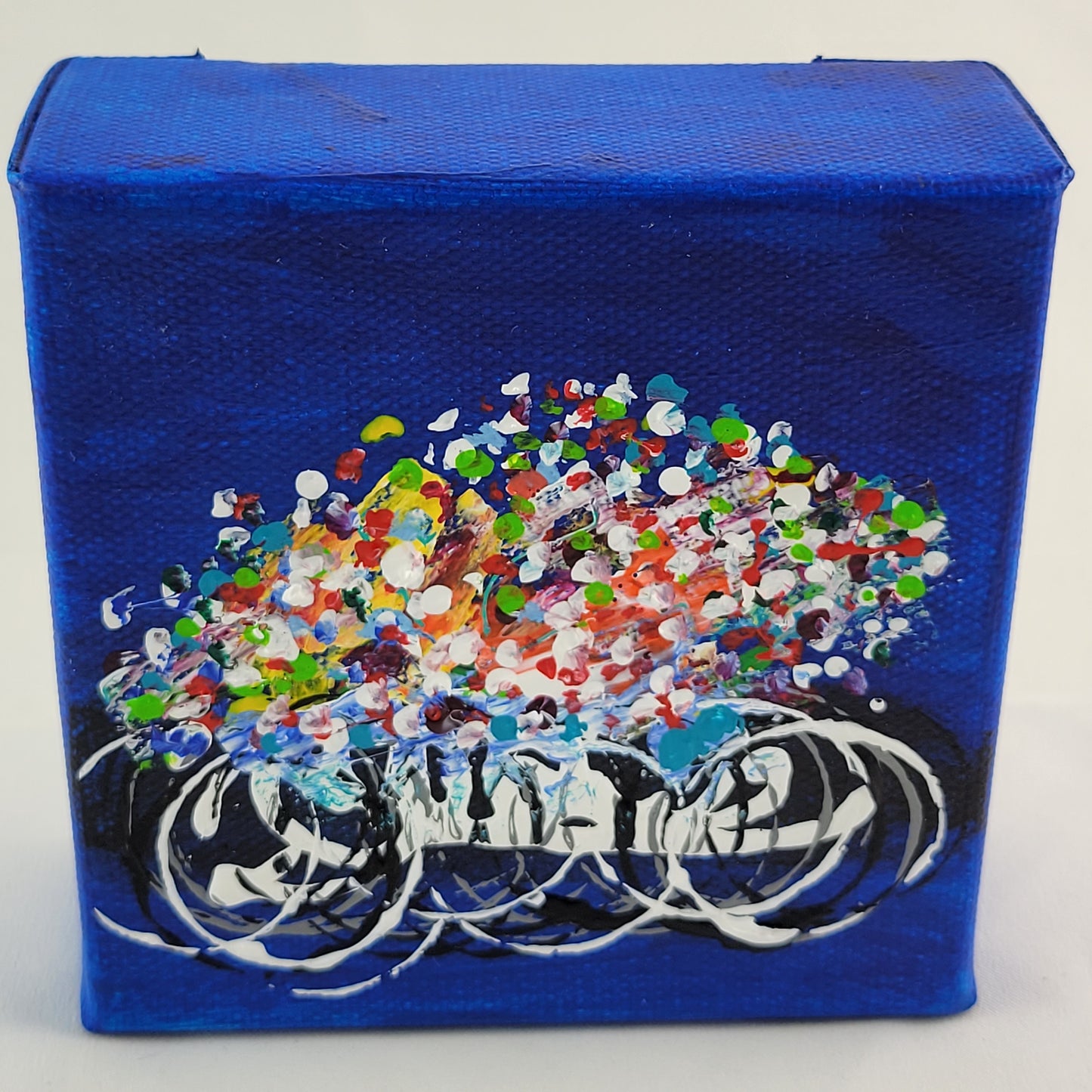4x4 inch canvas painting with blue background and bold colors
