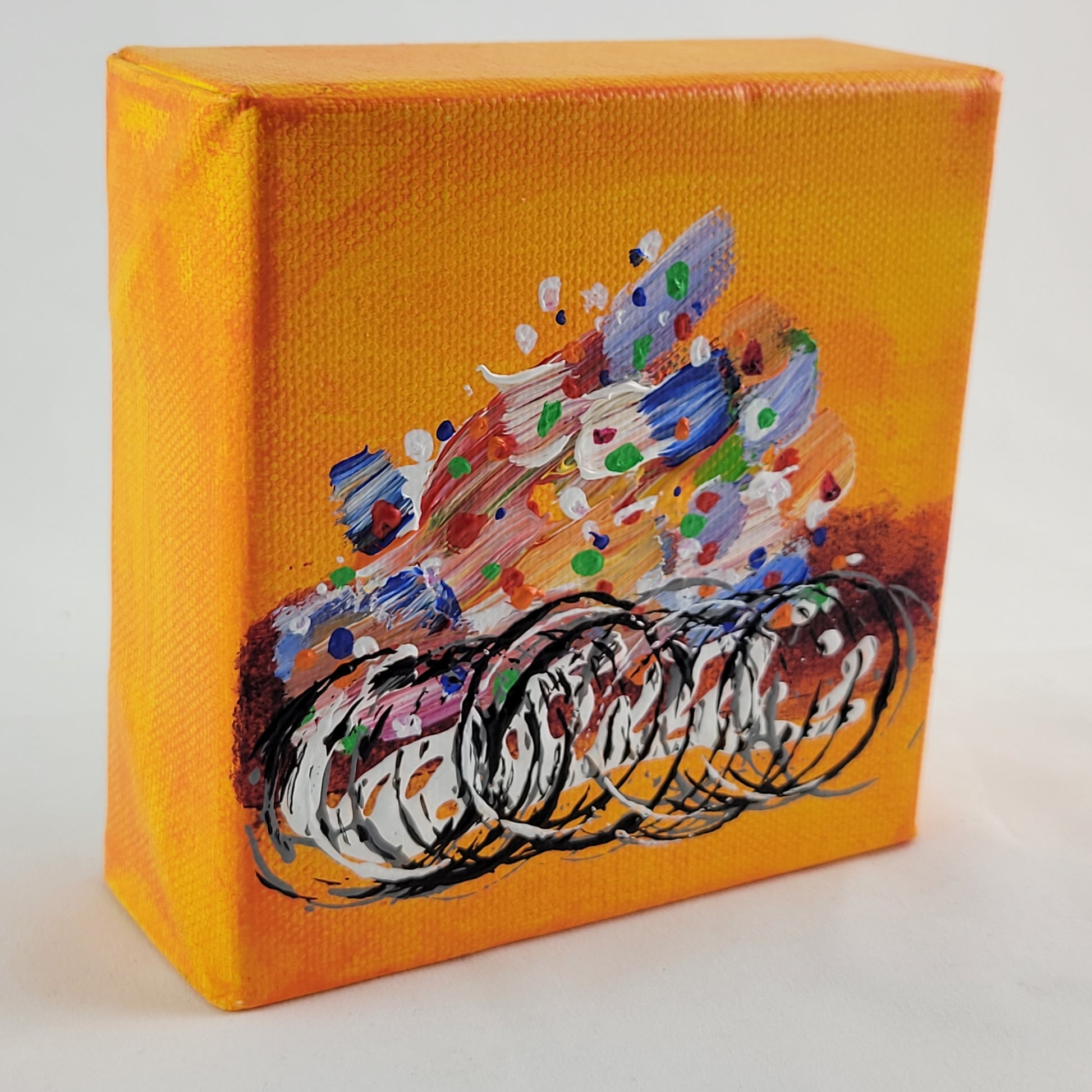 4x4 inch canvas painting with orange background and bold colors