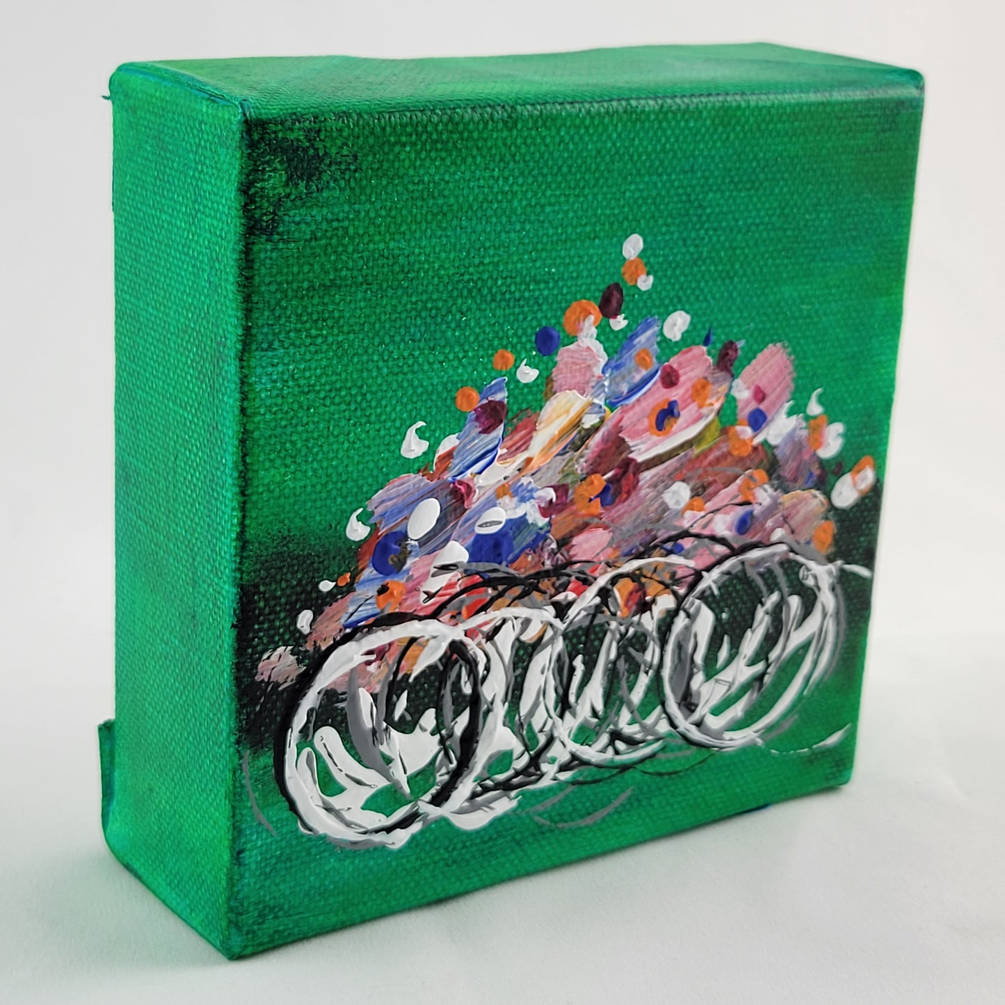 4x4 inch canvas painting with green background and bold colors