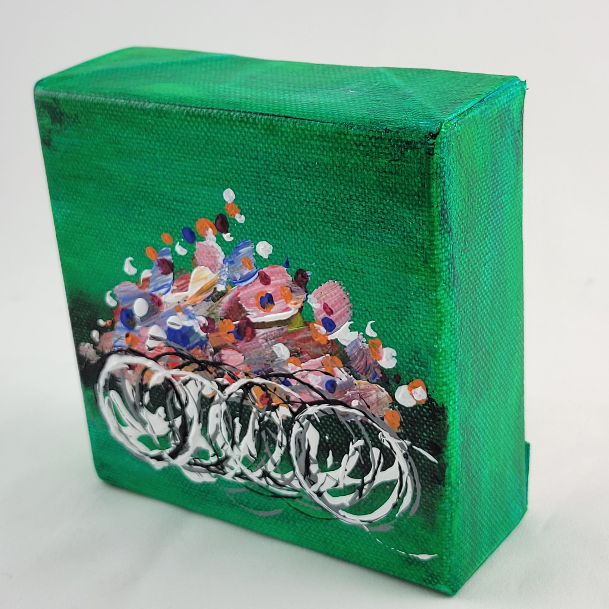 4x4 inch canvas painting with green background and bold colors