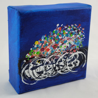 4x4 inch canvas painting with blue background and bold colors