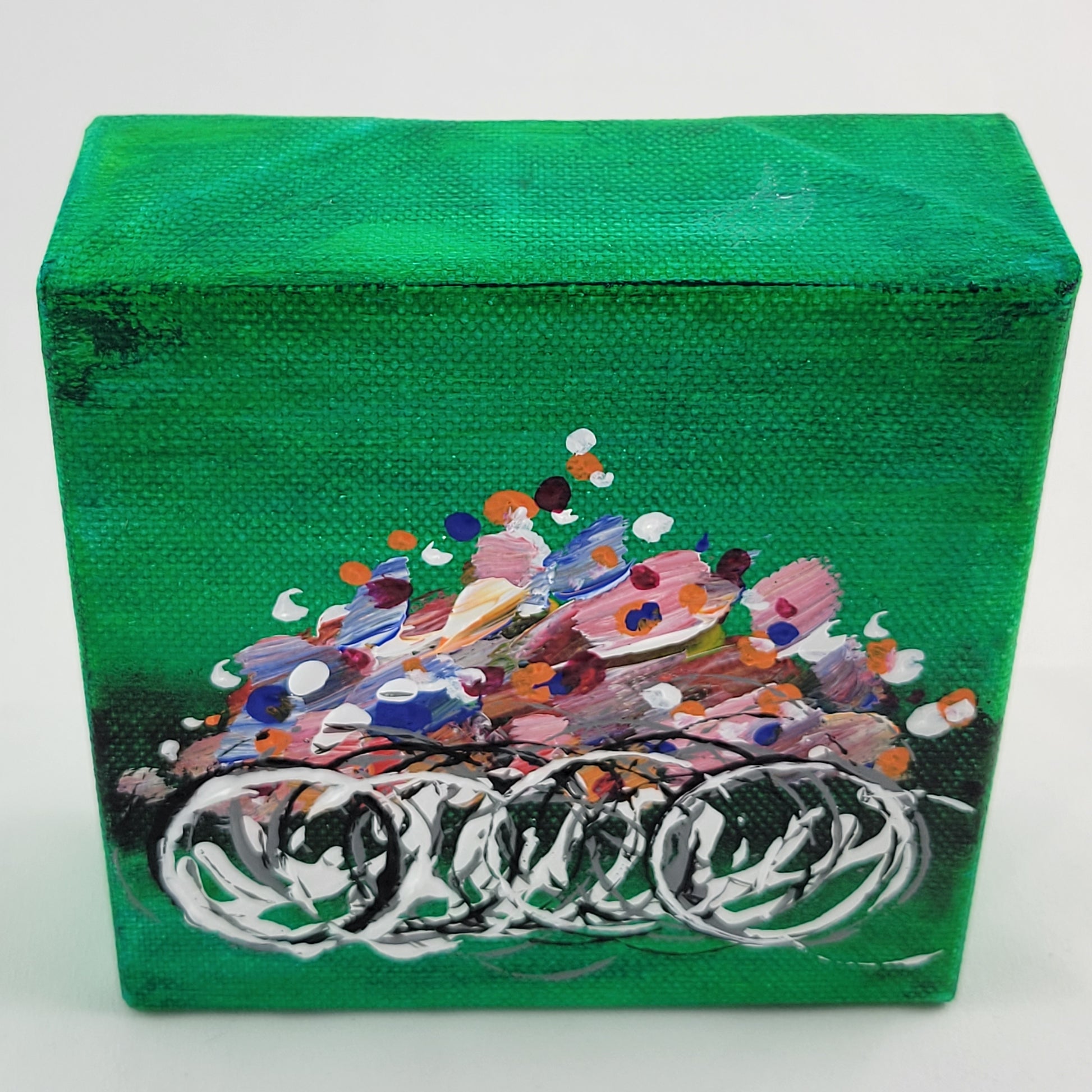 4x4 inch canvas painting with green background and bold colors
