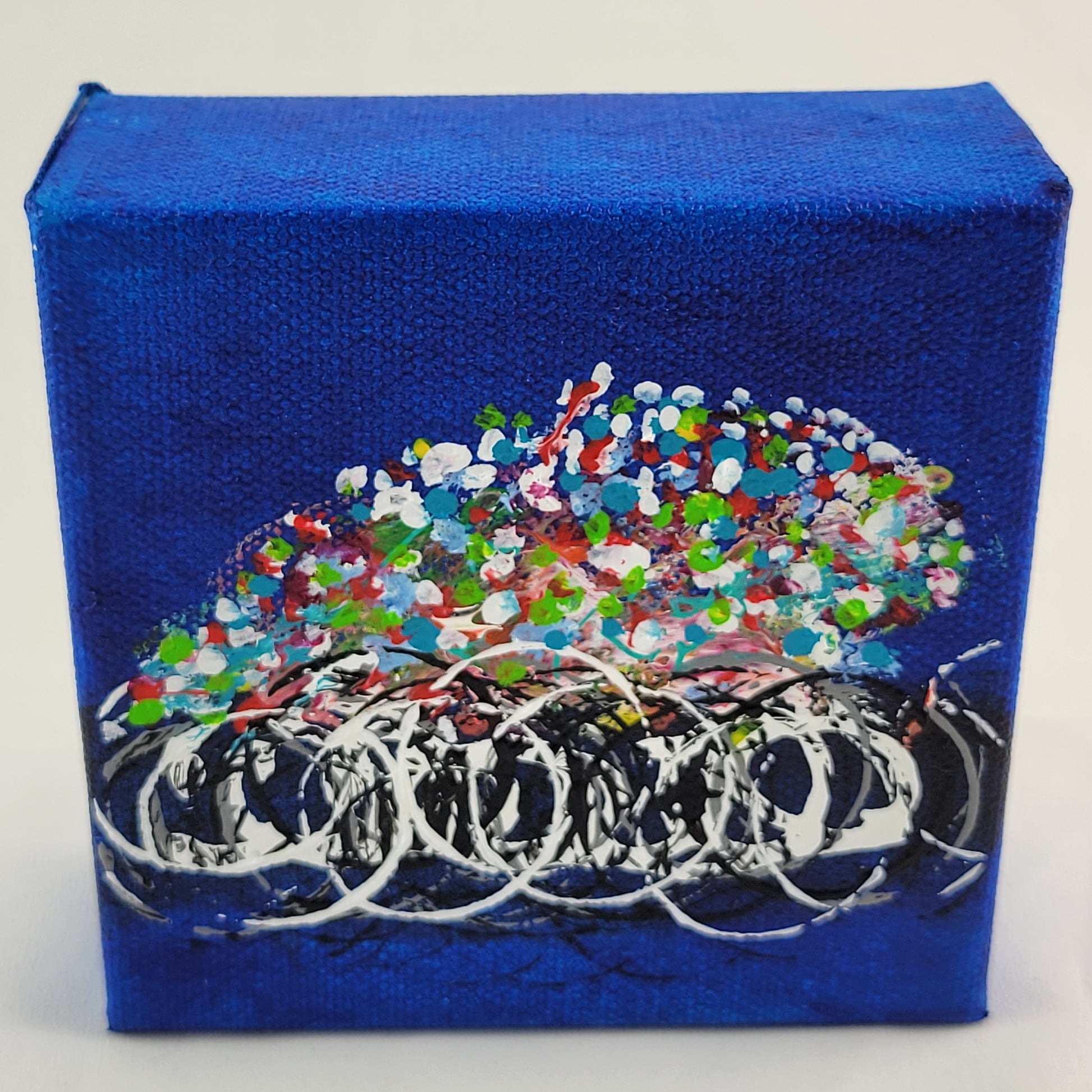 4x4 inch canvas painting with blue background and bold colors