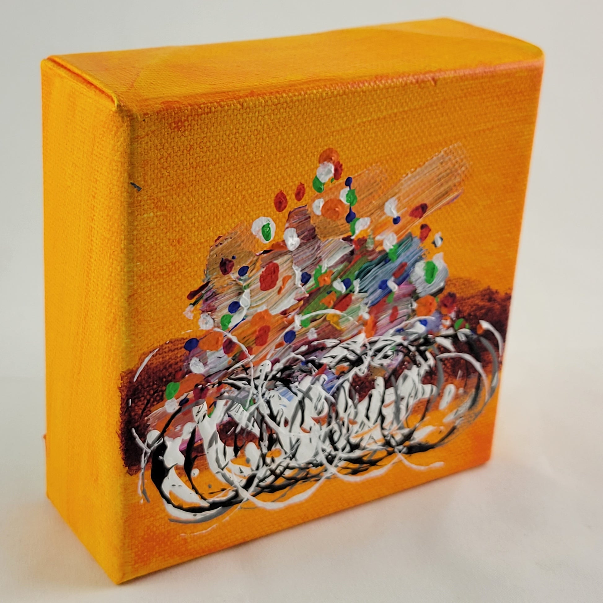 4x4 inch canvas painting with orange background and bold colors