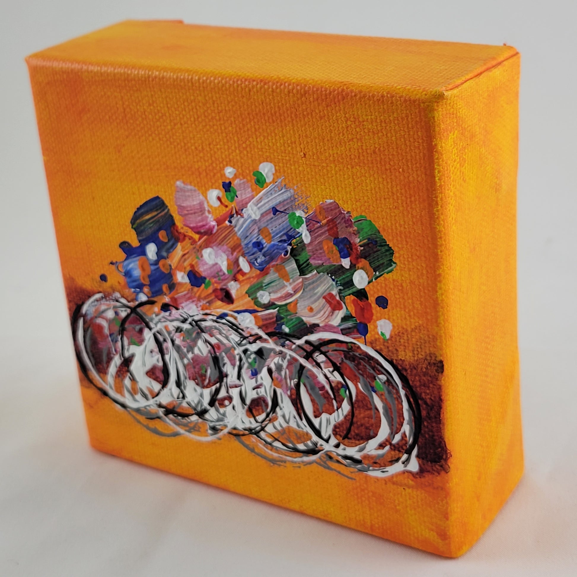 4x4 inch canvas painting with orange background and bold colors