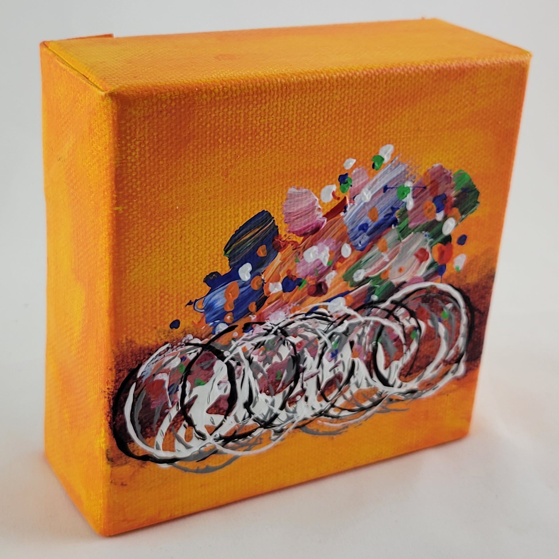 4x4 inch canvas painting with orange background and bold colors