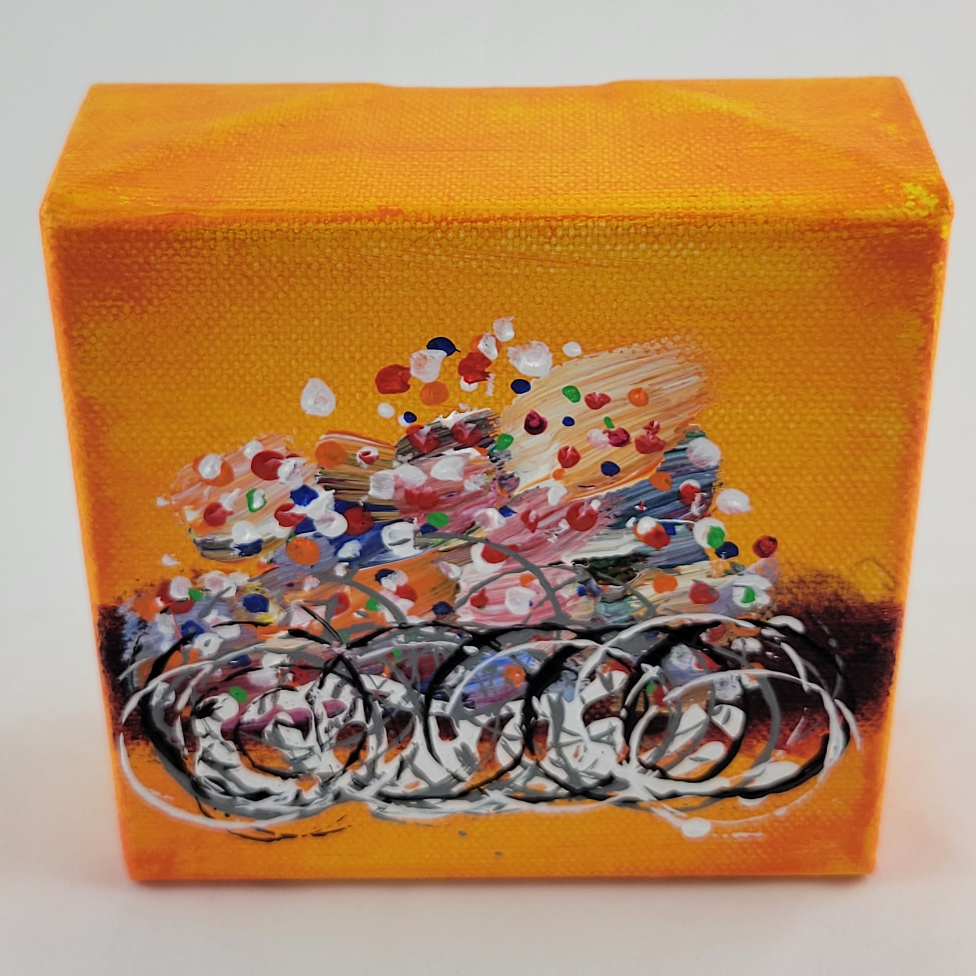 4x4 inch canvas painting with orange background and bold colors