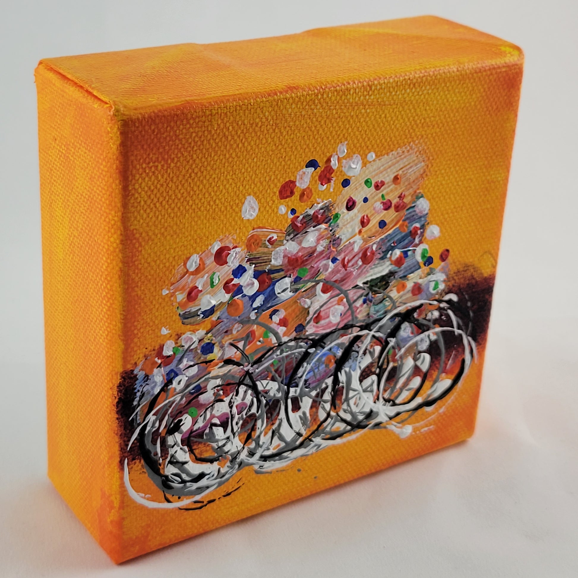 4x4 inch canvas painting with orange background and bold colors
