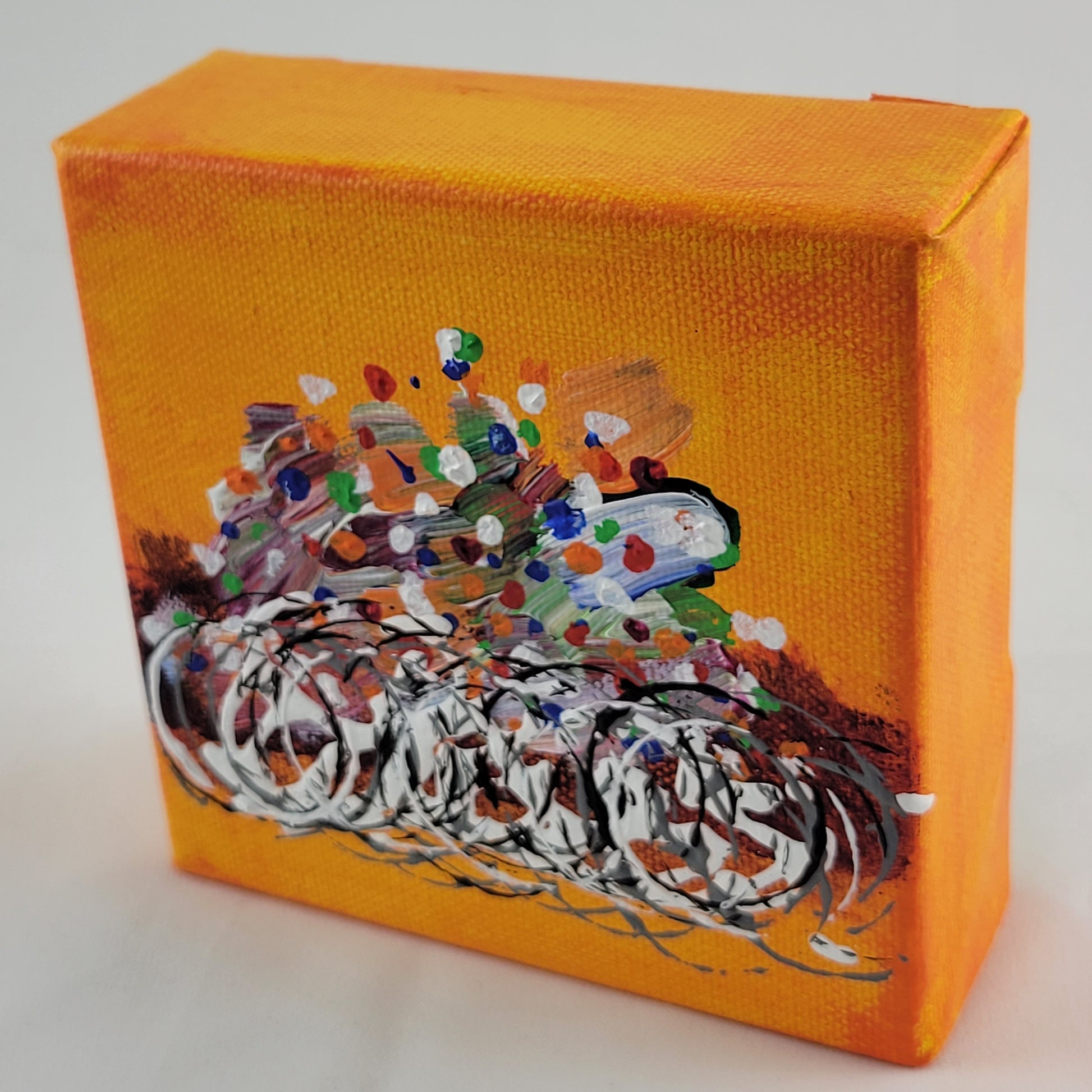 4x4 inch canvas painting with orange background and bold colors