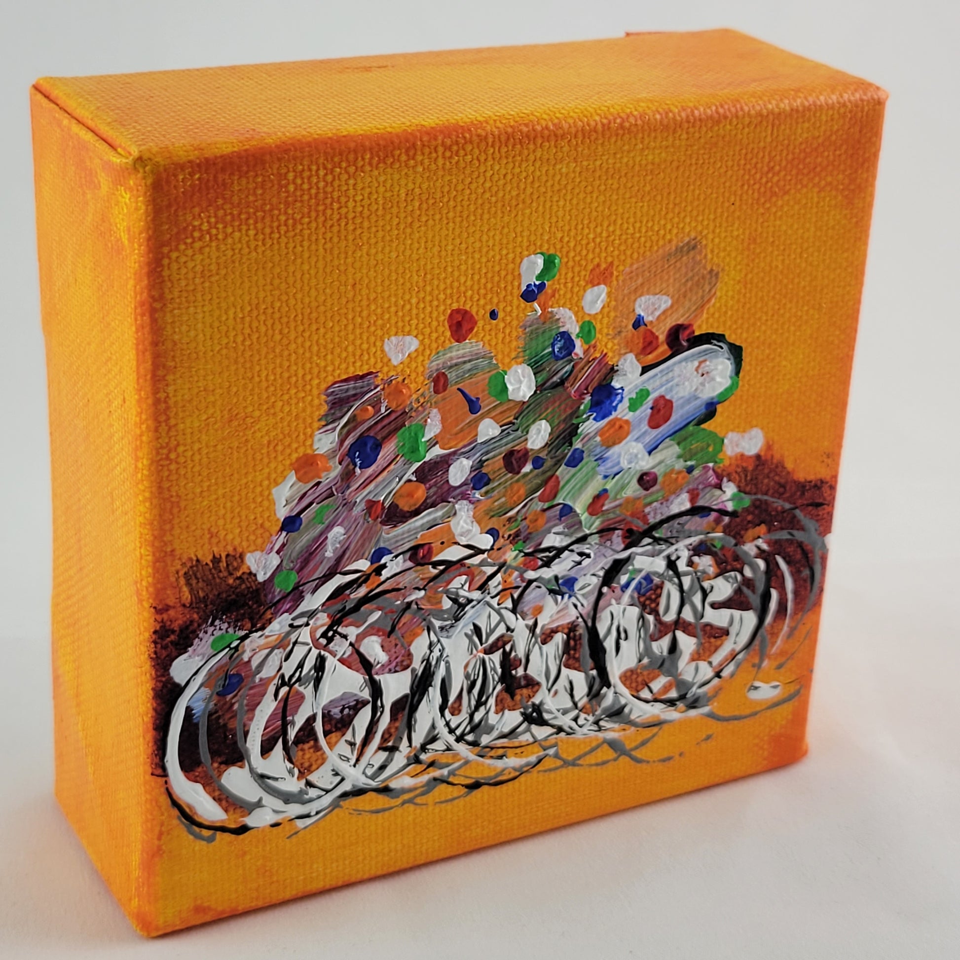 4x4 inch canvas painting with orange background and bold colors
