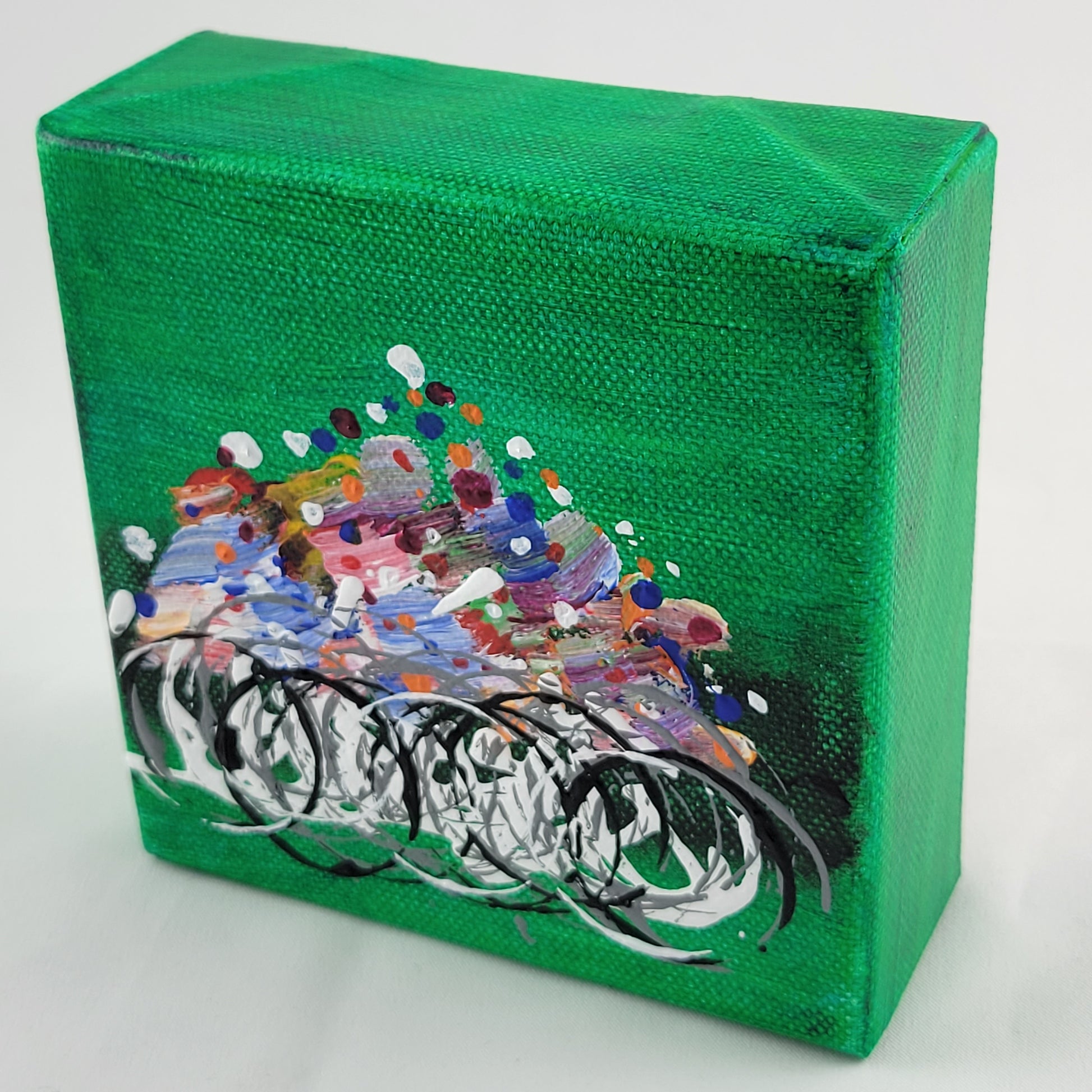 4x4 inch canvas painting with green background and bold colors