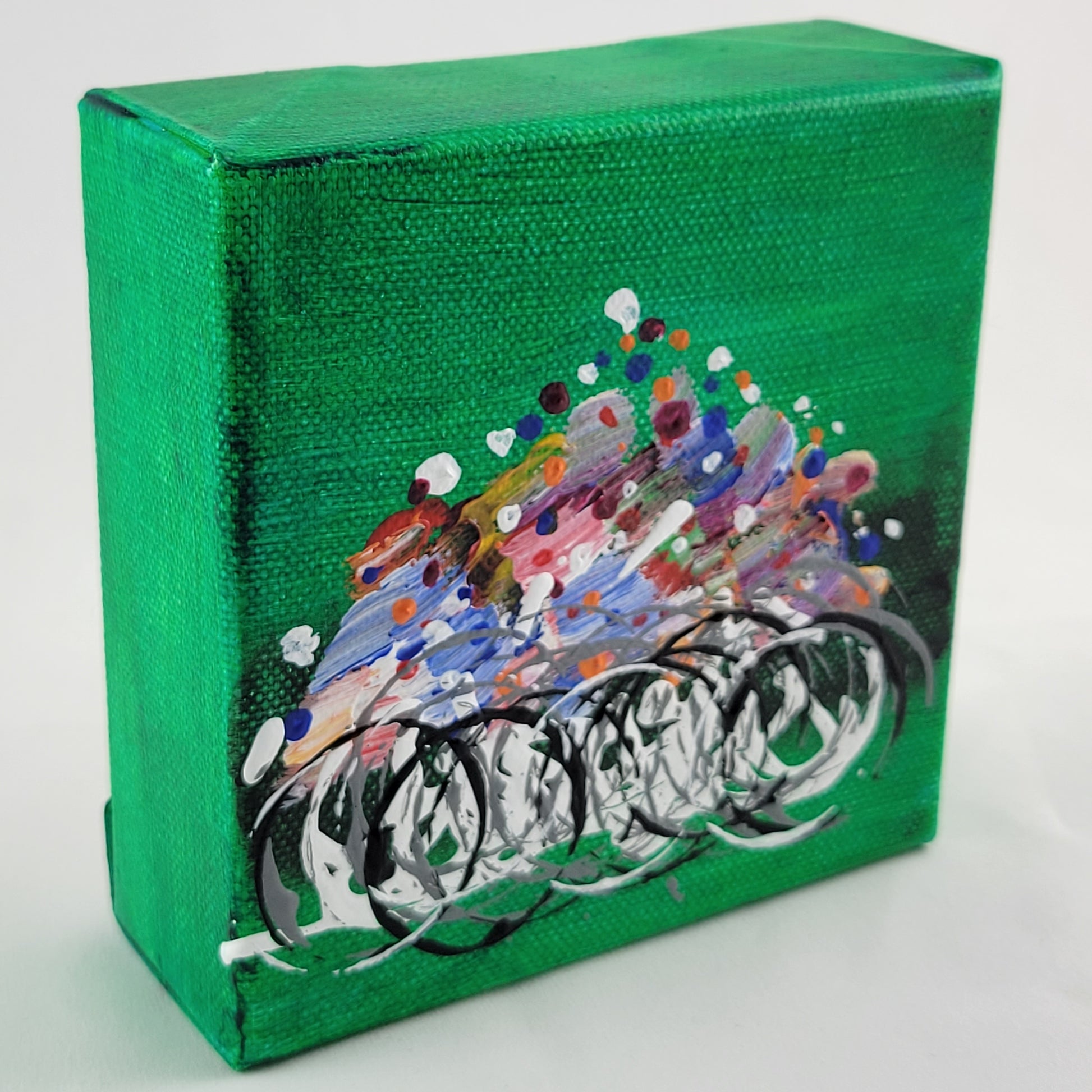 4x4 inch canvas painting with green background and bold colors