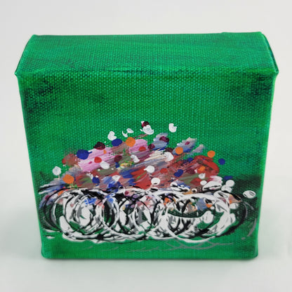4x4 inch canvas painting with green background and bold colors