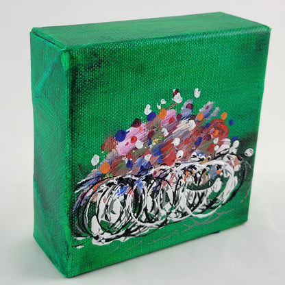 4x4 inch canvas painting with green background and bold colors