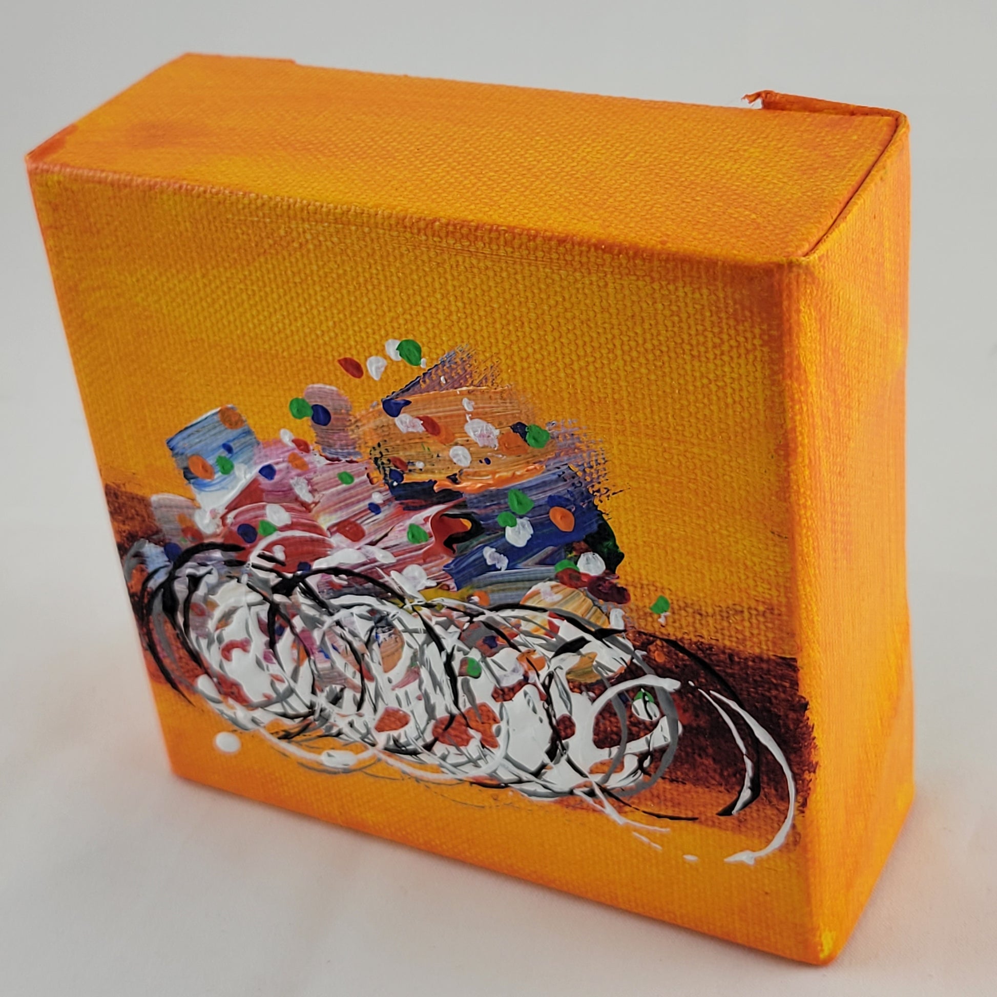 4x4 inch canvas painting with orange background and bold colors