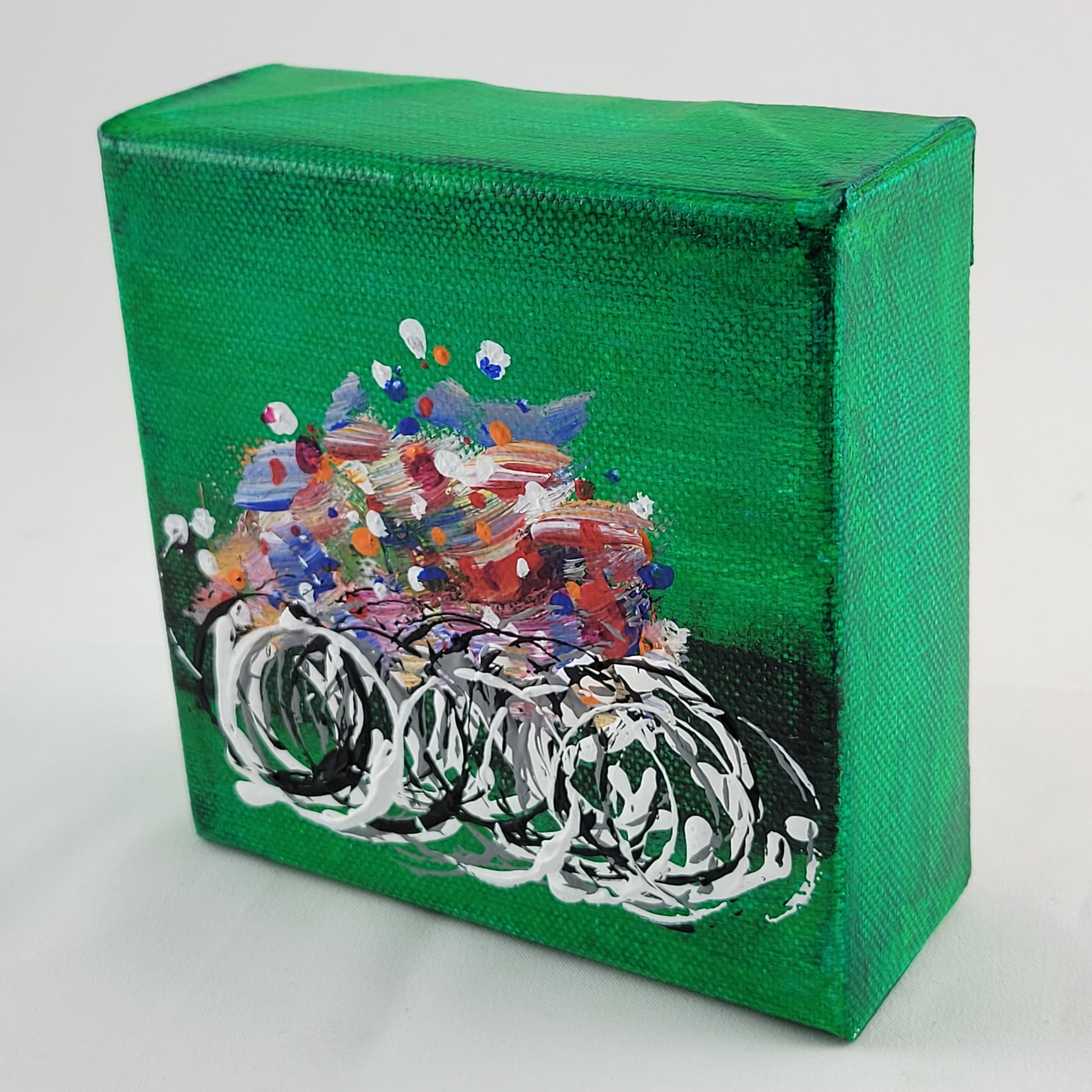 4x4 inch canvas painting with green background and bold colors