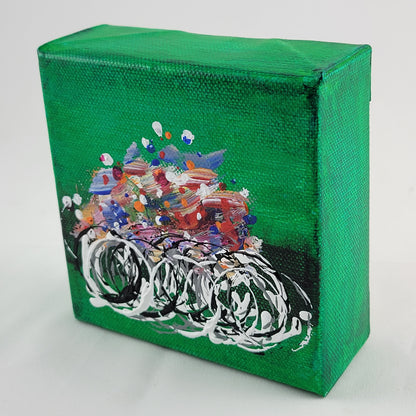 4x4 inch canvas painting with green background and bold colors