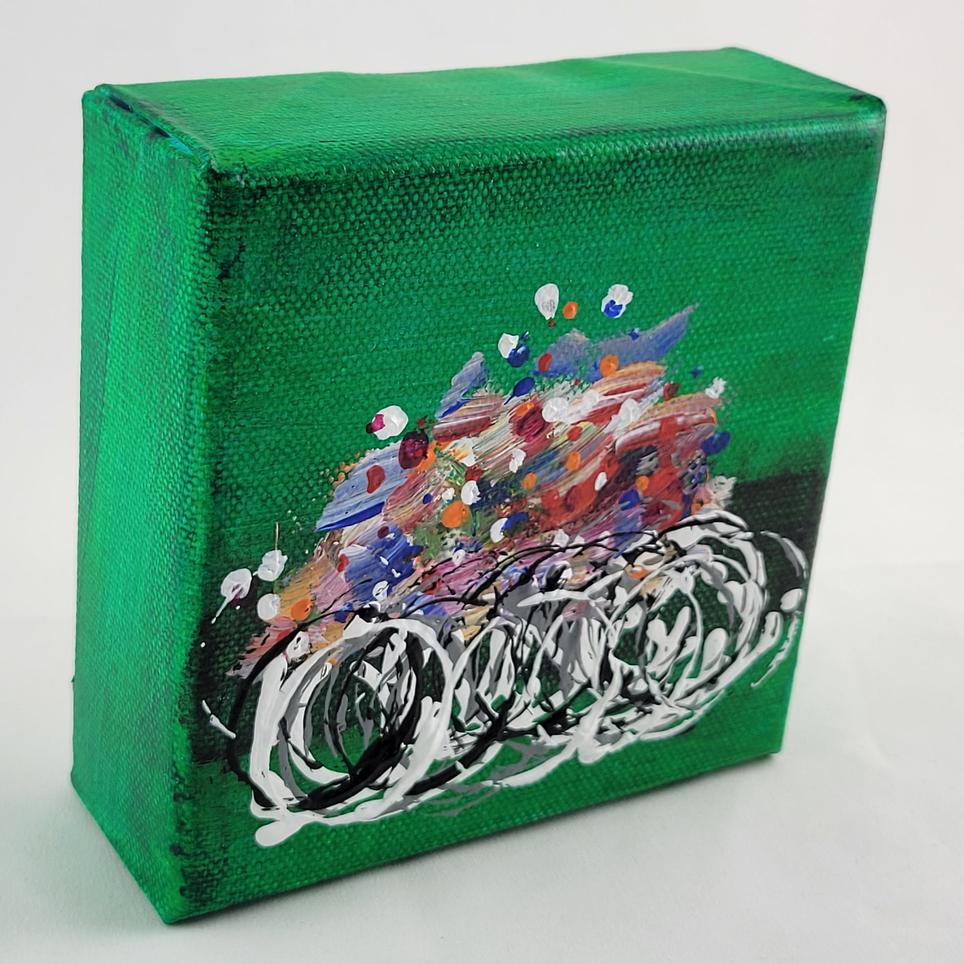 4x4 inch canvas painting with green background and bold colors