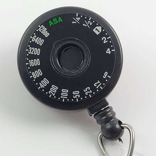 ID BADGE REEL - CANON A-1 ASA FILM SPEED DIAL #001