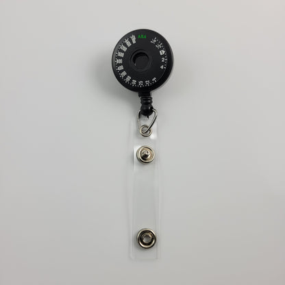 ID BADGE REEL - CANON A-1 ASA FILM SPEED DIAL #001
