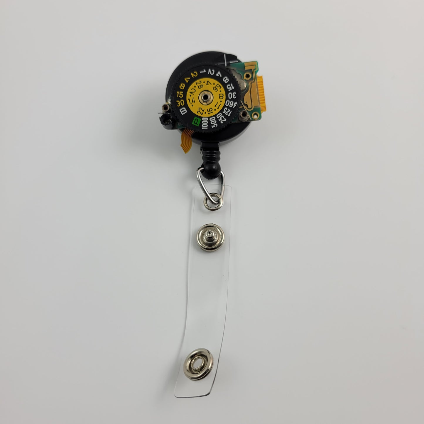ID BADGE REEL - CANON A-1 SHUTTER SPEED DIAL #004